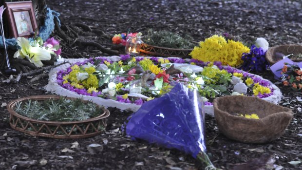 Mourners were encouraged to leave notes, flowers and candles at the memorial