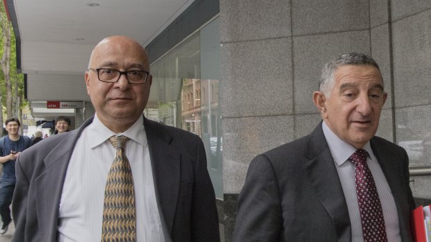 Bechara Khouri (left) leaves ICAC with his barrister Steve Stanton.