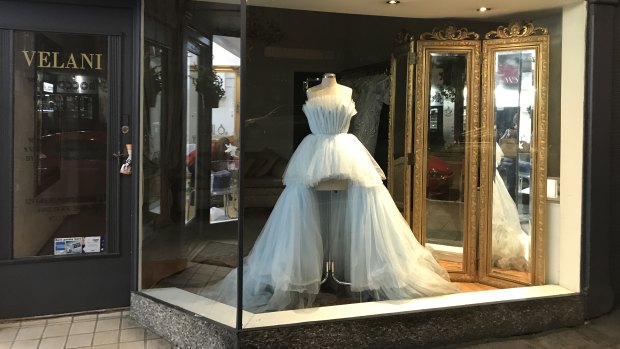 Back on the rack: Roxy Jacenko's mullet dress in the window of Five Dock "couturier" Velani 48 hours after the Gold Dinner.
