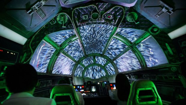 Jumping to lightspeed throws you back in your seat in the Smuggler's Run ride.