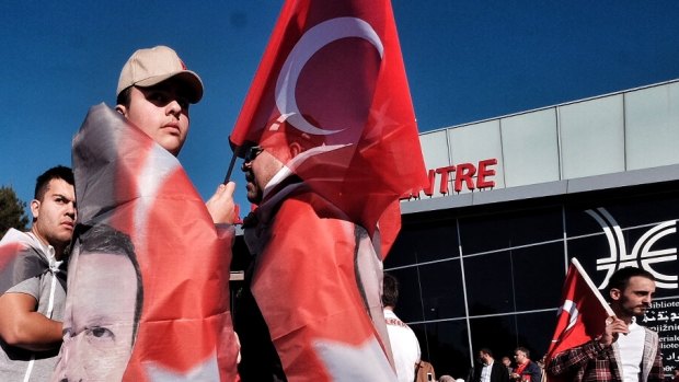Members of Melbourne's Turkish community meet outside Broadmeadows Library in Melbourne, in support of Turkey's president after a failed coup attempt in Turkey. Melbourne, Saturday July 16, 2016. Photo: Luis Ascui
