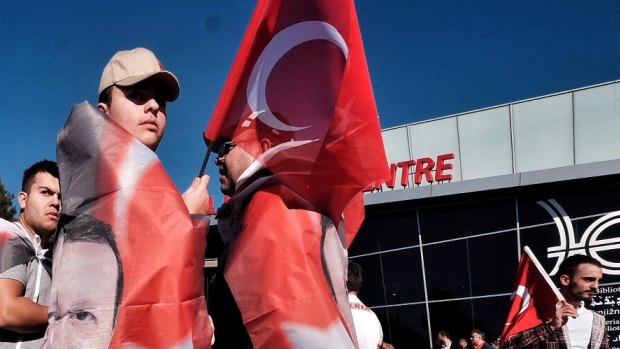 Members of Melbourne's Turkish community meet outside Broadmeadows Library in Melbourne, in support of Turkey's president after a failed coup attempt in Turkey. Melbourne, Saturday July 16, 2016. Photo: Luis Ascui