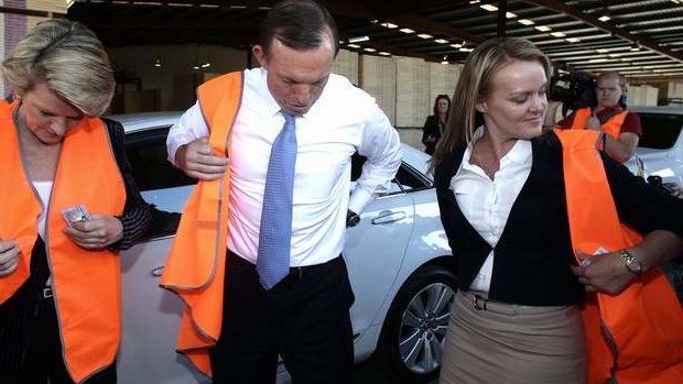 Deputy Opposition Leader Julie Bishop, Opposition Leader Tony Abbott and Liberal candidate Fiona Scott during a visit to a door manufacturer in Western Sydney