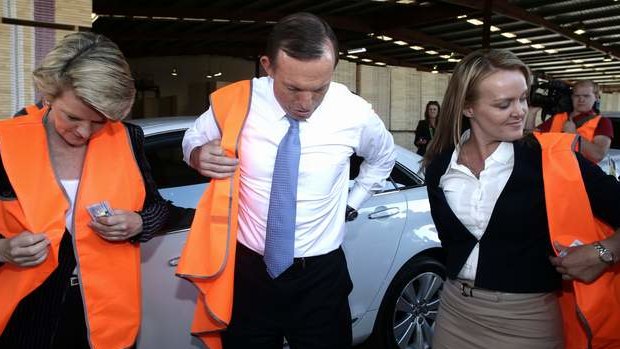 Deputy Opposition Leader Julie Bishop, Opposition Leader Tony Abbott and Liberal candidate Fiona Scott during a visit to a door manufacturer in Western Sydney