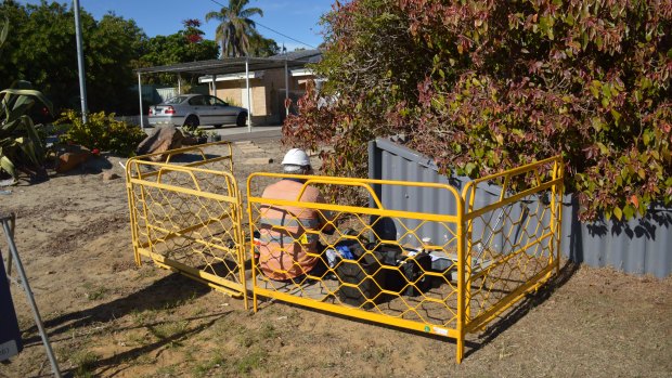 A technician installs NBN in front of a home in Wanneroo.