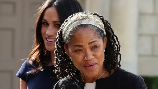 Meghan Markle, background and her mother, Doria Ragland, arrive at Cliveden House Hotel, in Berkshire, England on May 18.