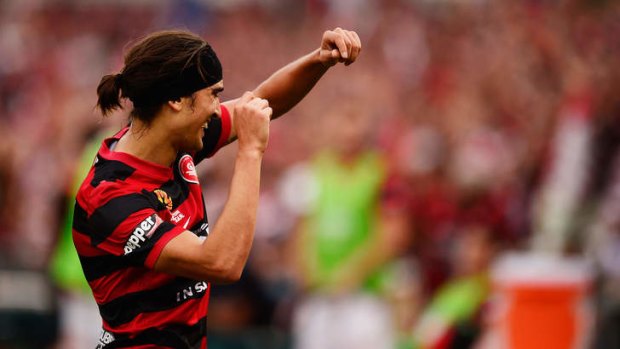All smiles: Jerome Polenz after his goal for Western Sydney Wanderers.