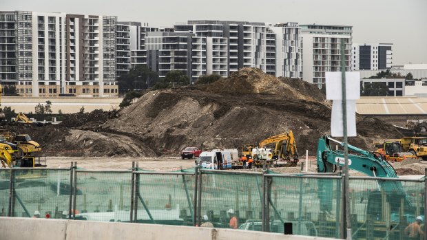 Westconnex work near St Peters, with apartment developments in the distance.
