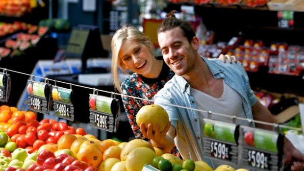 Master Chef winner Brent Owens with girlfriend Madison Ancrum at the Prahran Market. 