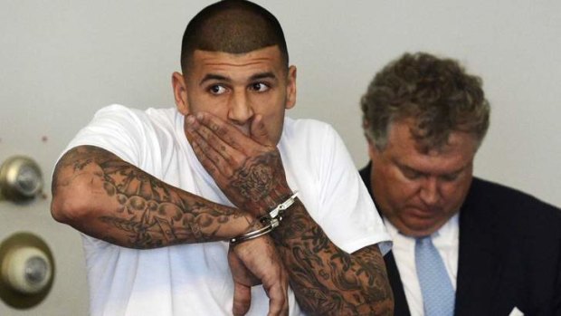 New England Patriots star Aaron Hernandez is arraigned on charges of murder and weapons violations in Massachusetts.