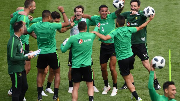 Upbeat: The Socceroos are enjoying home comforts in Kazan ahead of their World Cup opener against France. It is helping them relax before their game one pressure cooker. 