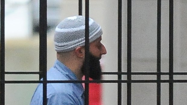 Adnan Syed walks into the court in Baltimore before a hearing in 2017. 