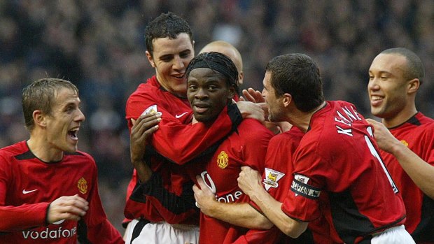 Louis Saha, center, is congratulated after scoring his first goal for Manchester United against Southampton in 2004. 