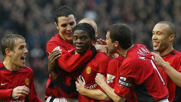 Louis Saha, center, is congratulated after scoring his first goal for Manchester United against Southampton in 2004. 