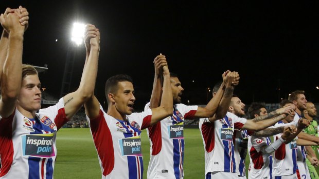 Back to form: The Jets players thanks their travelling supporters.