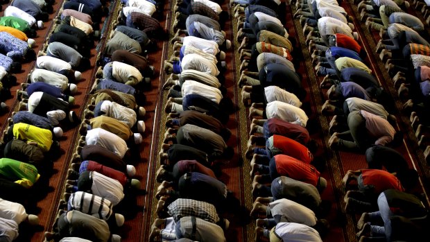 Muslims in Indonesia perform an afternoon prayer during Ramadan. 