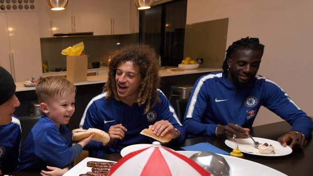 Chelsea FC players David Luiz, Tiemoue Bakayoko and Ethan Ampadu had a barbecue with Hudson McCarthy, 4, and his family last night.