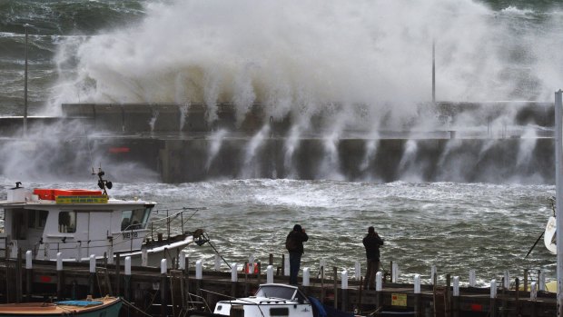 Large waves hit the Mornington pier during a storm on Tuesday. 