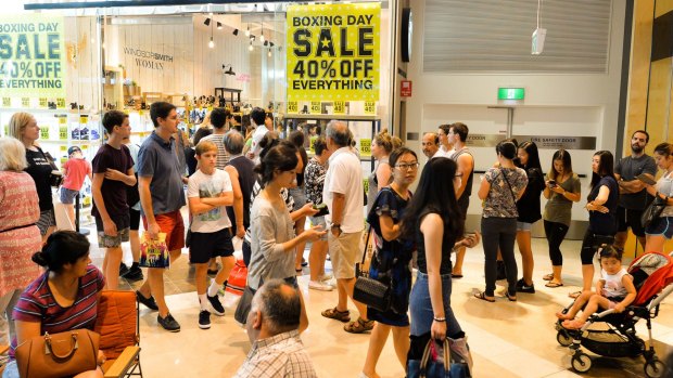 Bargain hunters are expected to have splurged a record $2.3 billion nationwide when the latest sales launched on Boxing Day.