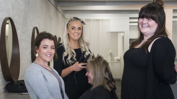 Kalinda McClellan-Weaver, left, who was in a desperate situation at Karinya House and now with the help of KOVU Hair co-owners, Samantha Harvey and Catherine Hickey, has a full time apprenticeship at the salon.