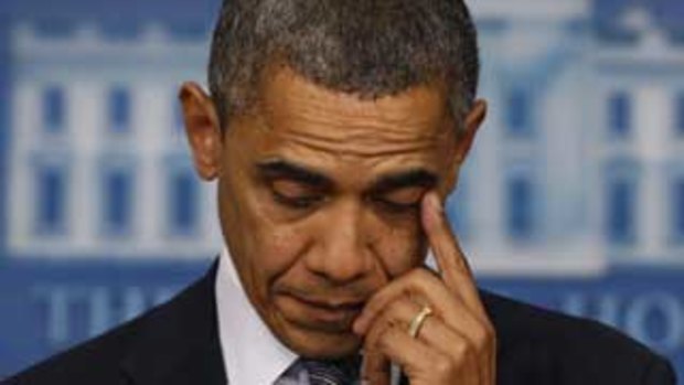 US President Barack Obama wiped away a tear as he spoke about the shooting at Sandy Hook Elementary School in Newtown, Connecticut.