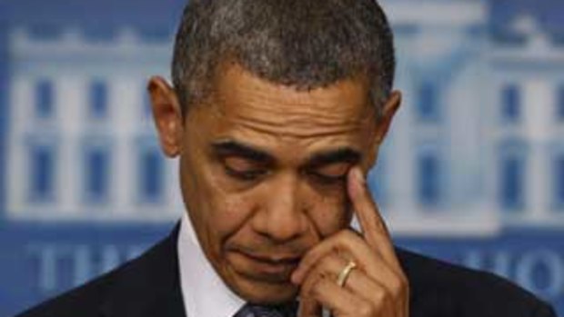 US President Barack Obama wiped away a tear as he spoke about the shooting at Sandy Hook Elementary School in Newtown, Connecticut.