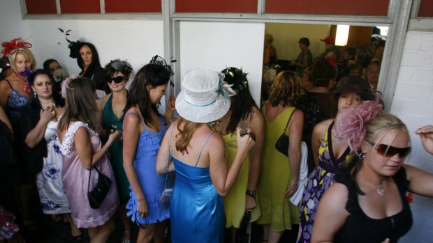 Women line up to use the toilets at the Melbourne Cup.