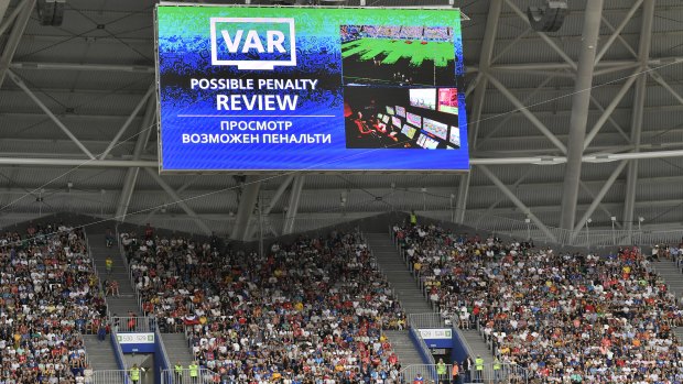 Helping hand: The VAR was called on to award Australia a penalty today. 