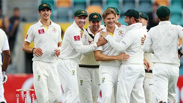 The third wicket ... Teammates get around Shane Watson after he removed Mahela Jayawardene.