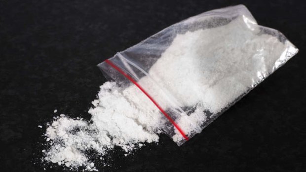 Mephedrone (aka meow, bubbles) powder on counter top in plastic bag