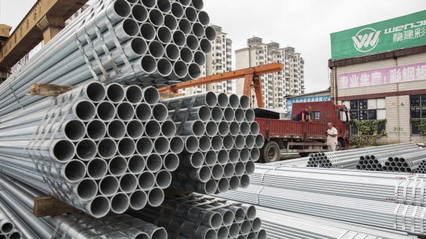 Bundles of steel pipe sit stacked at a stockyard on the outskirts of Shanghai, China. Trump’s attempts to re-balance global trade have already sent the metals world into a tizzy, and the disarray is set to increase. 