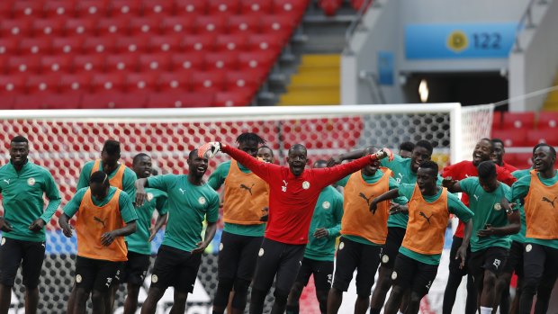 Senegal's players train in preparation for their clash against Poland.