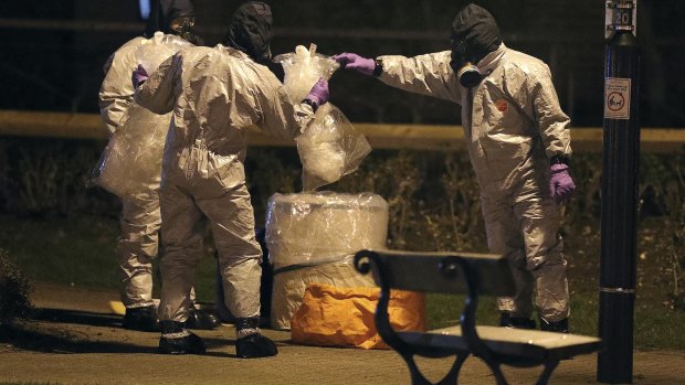 Investigators in protective suits work in Salisbury, England, in March following the Skripal poisoning.