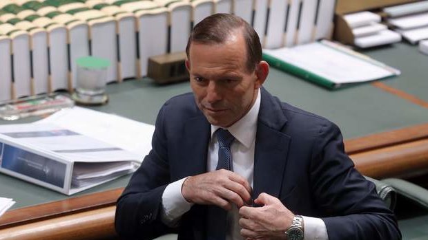 Prime Minister Tony Abbott packs up after question time on Tuesday. Photo: Andrew Meares