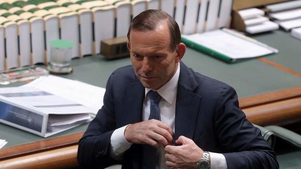 Prime Minister Tony Abbott packs up after question time on Tuesday. Photo: Andrew Meares