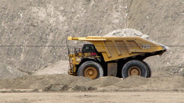 Moody's has put the ratings of four more miners under review for a possible downgrade.