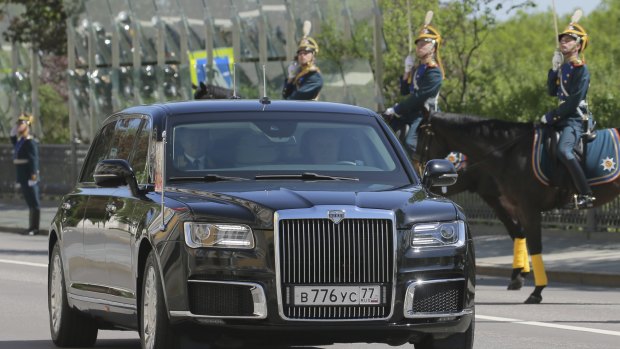 For the first time, Putin rode in a limousine made in Russia rather than a German-made Mercedes.