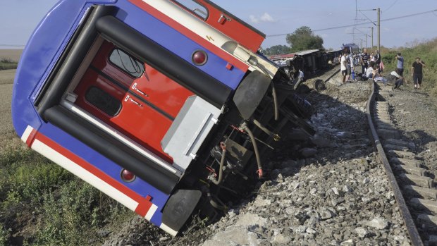 An overturned train car is seen near a village at Tekirdag province in Turkey.