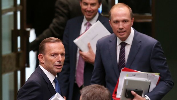 Prime Minister Tony Abbott and Immigration Minister Peter Dutton leave question time on Tuesday.