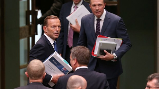 Prime Minister Tony Abbott and Immigration Minister Peter Dutton leave question time on Tuesday.