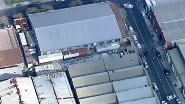 Staff were clearing out the building in an industrial area when the grisly discovery was made.