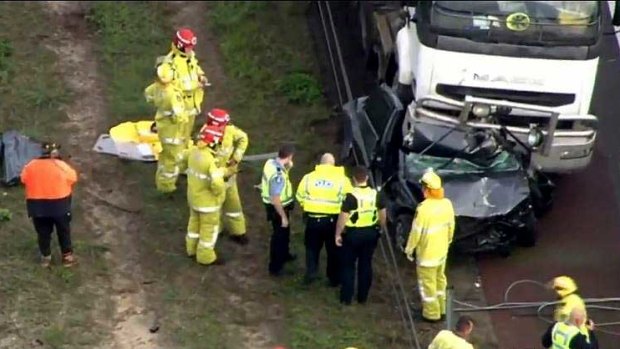 A woman was rushed to hospital after a truck and two cars crashed into each other on Kwinana Freeway.