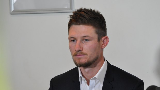 Cameron Bancroft addresses media after arriving back in Perth from South Africa.