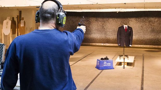 Extra protection: A marksman shoots a handgun at the bulletproof suit.