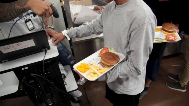 A young person at the cafeteria at the child immigrant detention facility in Brownsville, Texas called Casa Padre.