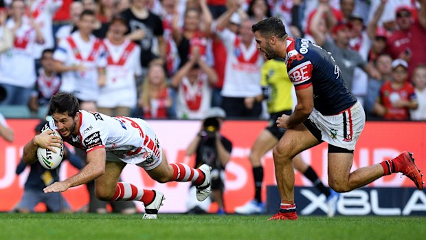 Try time: Ben Hunt crosses before half-time in the Dragons' 24-8 victory.