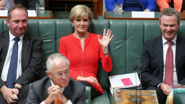 Foreign Affairs Minister Julie Bishop waves to deputy opposition leader Tanya Plibersek during question time on Tuesday.