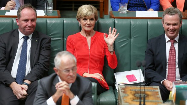 Foreign Affairs Minister Julie Bishop waves to deputy opposition leader Tanya Plibersek during question time on Tuesday.