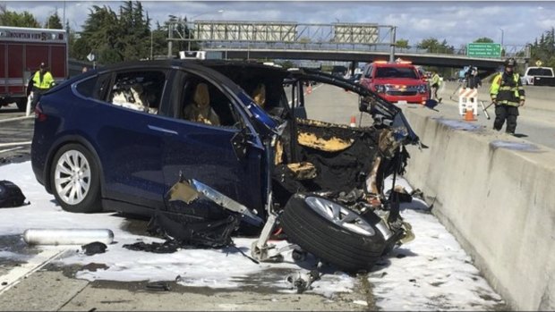 Tesla says the crash happened on a clear day with several hundred feet of visibility ahead.