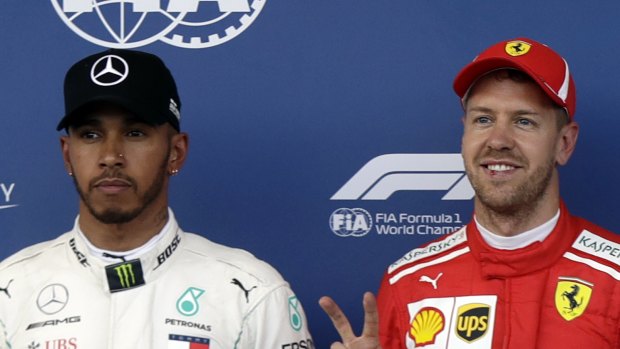 Return: Lewis Hamilton with Sebastian Vettel.